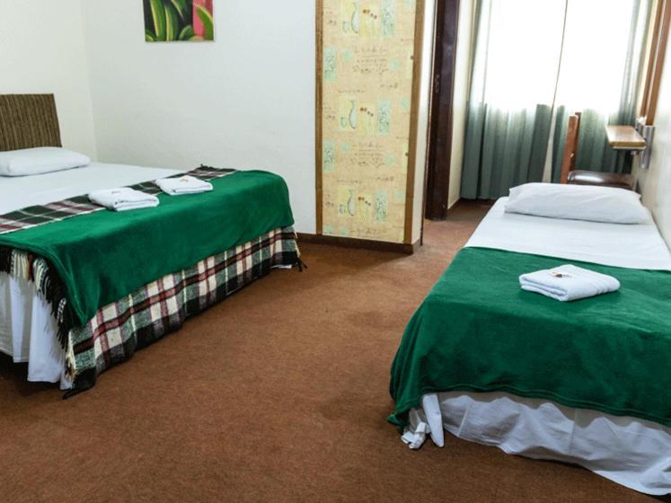 Hotel Pousada Icarai Poços de Caldas Buitenkant foto